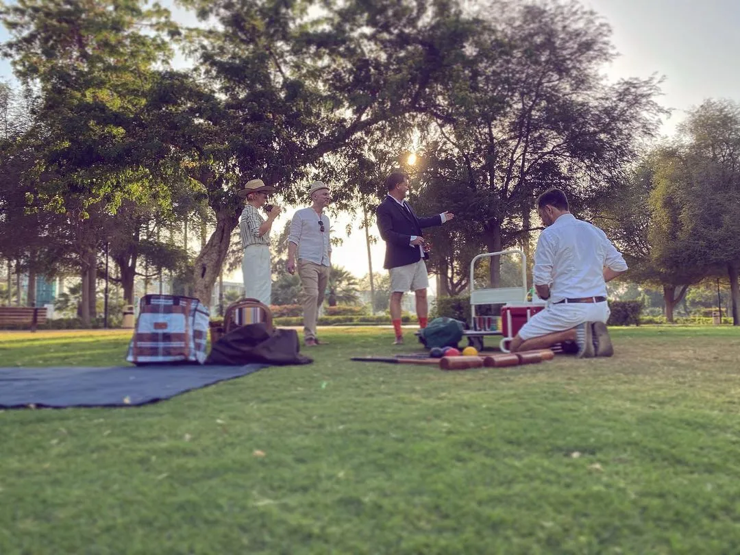 Croquet hoops and mallets set up on the lawn
