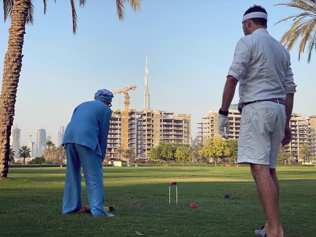 Fashion icon playing croquet